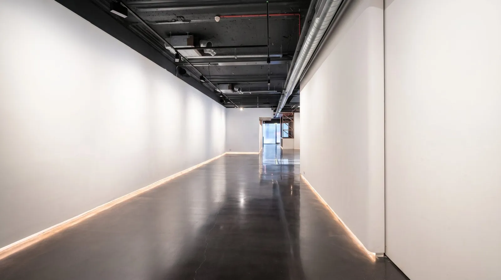 Polished concrete corridor floor at our 3 Hanover Square project in London